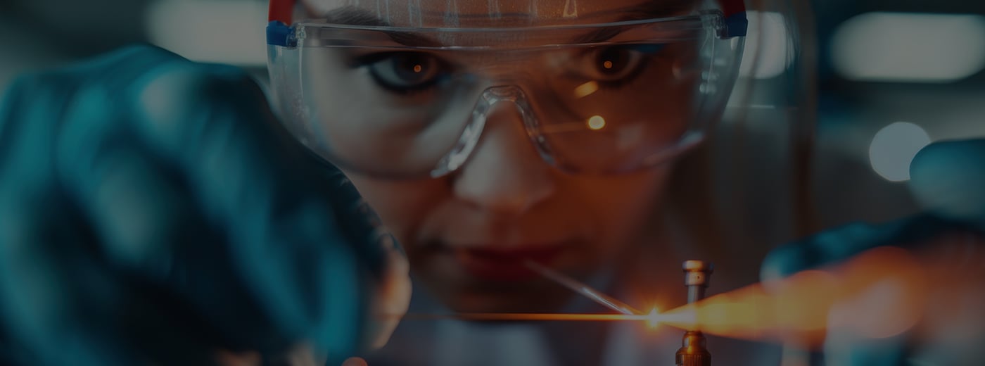 a technician working on advanced, futuristic equipment, highlighting their focus and expertise in handling complex and high-tech machinery in a lab environment
