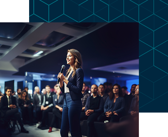 Photo of young woman on stage with speech