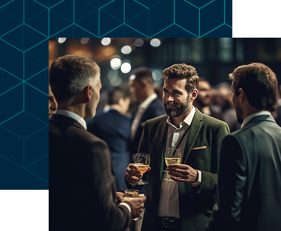 Group of business executives meeting at a networking event, cheering with glasses of wine