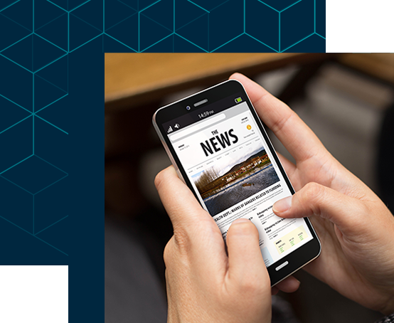 a mobile phone showing news